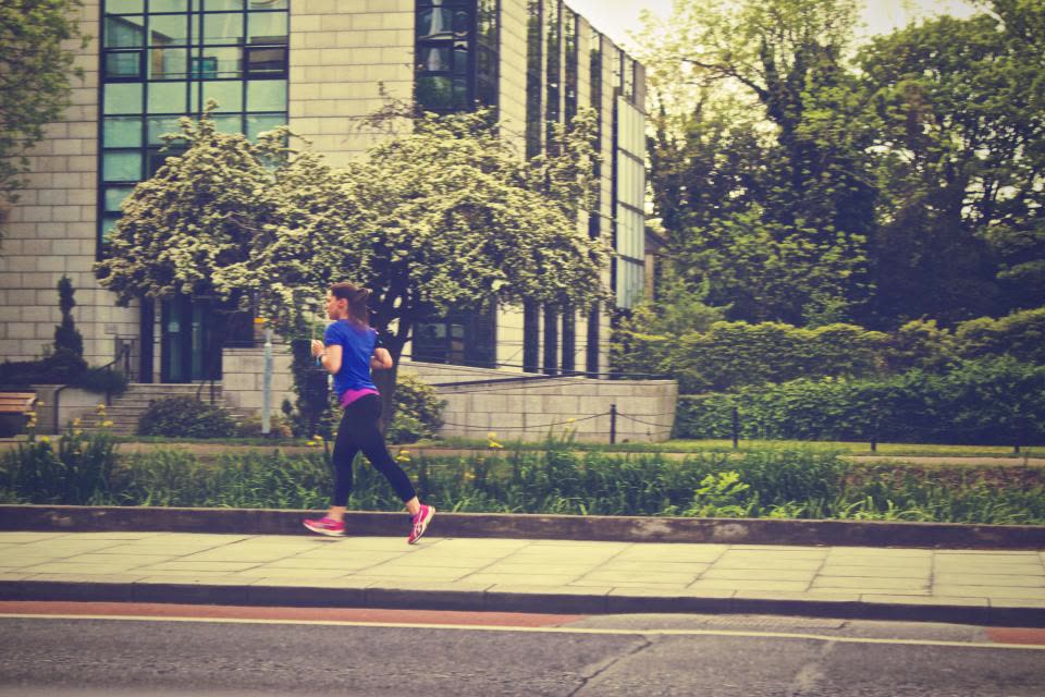 Runner training on a city street
